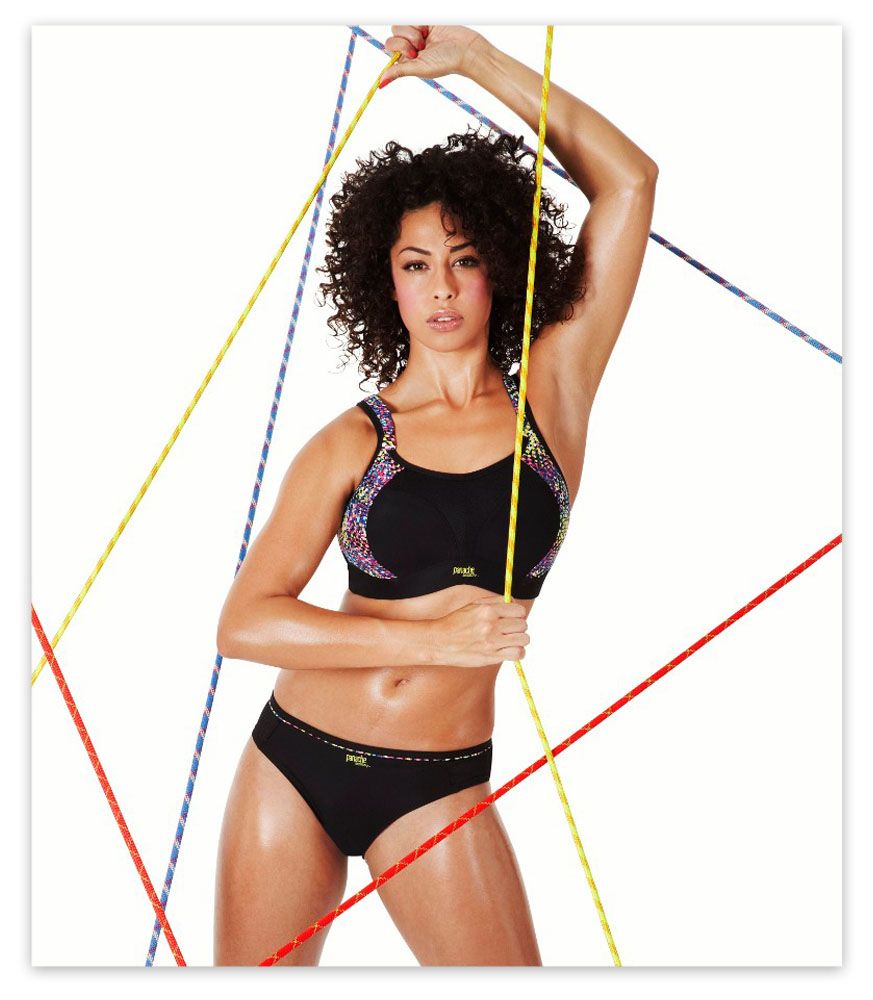 model wears panache non-wired sports bra in geo print. coloured rope background